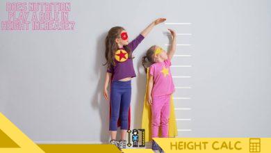 2 little girls check height